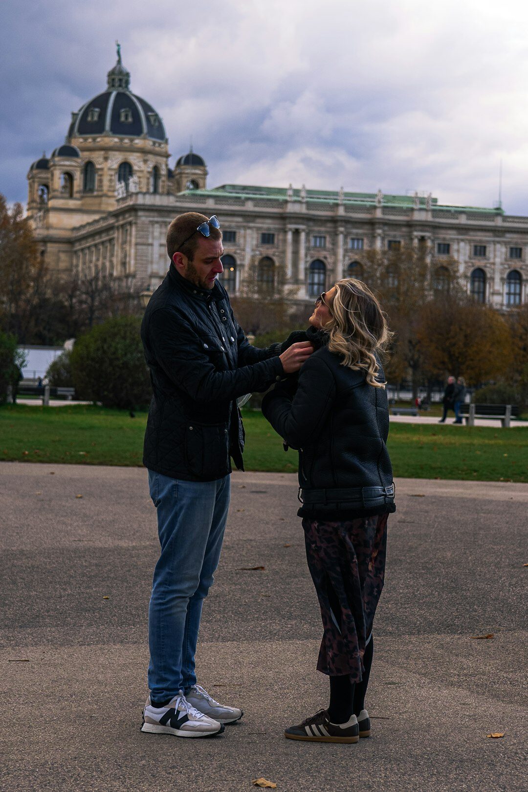 Two European business professionals shaking hands at a networking event